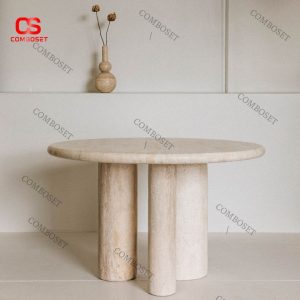 Bàn ăn đá travertine kiểu Bắc Âu ược thiết kế bởi kiến ​​trúc sư người Milan Mario Bellini.