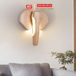 Đèn Tường Gỗ Nguyên Khối Hình Voi, Đèn LED Treo Tường Decor Bắc Âu Cho Phòng Khách, Hành Lang Giới thiệu Đèn LED treo tường ngày càng được nhiều gia đình lựa chọn nhờ khả năng kết hợp giữa chiếu sáng và trang trí nội thất. Mẫu đèn tường hình voi bằng gỗ mang phong cách Bắc Âu tạo điểm nhấn độc đáo với đường nét tối giản, chất liệu gỗ tự nhiên và hiệu ứng ánh sáng hắt tường nhẹ nhàng. Không chỉ giúp bổ sung ánh sáng, sản phẩm còn góp phần làm nổi bật không gian phòng khách, phòng ngủ, hành lang, cầu thang, quán cà phê, homestay hoặc studio. Thiết kế tinh tế giúp đèn dễ dàng kết hợp với nhiều phong cách nội thất hiện đại. H2: Thiết kế hình voi độc đáo mang phong cách Bắc Âu Điểm nổi bật của Đèn LED Treo Tường là thiết kế hình voi cách điệu, mang lại cảm giác gần gũi nhưng vẫn hiện đại. Sự kết hợp giữa chất liệu gỗ và nguồn sáng LED tạo nên sản phẩm vừa có tính ứng dụng vừa có giá trị trang trí, giúp bức tường trở nên sinh động và ấn tượng hơn. H2: Ánh sáng LED dịu nhẹ tạo không gian ấm cúng Nguồn sáng LED được bố trí phía sau thân đèn giúp ánh sáng tỏa đều, hạn chế chói mắt và tạo hiệu ứng hắt sáng nhẹ nhàng. Sản phẩm thích hợp sử dụng để: Trang trí phòng khách Trang trí phòng ngủ Chiếu sáng hành lang Khu vực cầu thang Góc đọc sách Homestay và quán cà phê H2: Chất liệu gỗ tự nhiên bền đẹp Đèn được hoàn thiện với chất liệu gỗ có vân đẹp, mang lại cảm giác mộc mạc và gần gũi. Kiểu dáng tối giản giúp sản phẩm dễ phối hợp với các phong cách nội thất như: Scandinavian Japandi Modern Minimalist Contemporary H2: Ưu điểm của Đèn LED Treo Tường Thiết kế hình voi độc đáo. Gỗ hoàn thiện đẹp, màu sắc hài hòa. Ánh sáng LED ổn định, dịu nhẹ. Tiết kiệm diện tích nhờ thiết kế treo tường. Phù hợp với nhiều không gian và phong cách nội thất. Dễ lắp đặt và vệ sinh. H2: Thông số sản phẩm Thông tin Chi tiết Tên sản phẩm Đèn Tường Gỗ Nguyên Khối Hình Voi Loại sản phẩm Đèn LED treo tường Phong cách Bắc Âu (Scandinavian) Chất liệu Gỗ tự nhiên (tùy phiên bản) Nguồn sáng LED Điện áp AC 220V Màu sắc Vân gỗ tự nhiên Không gian phù hợp Phòng khách, phòng ngủ, hành lang, cầu thang H2: Hướng dẫn sử dụng Lắp đặt trên tường chắc chắn theo hướng dẫn. Kết nối đúng nguồn điện theo thông số kỹ thuật. Vệ sinh bằng khăn mềm và khô. Tránh để sản phẩm tiếp xúc trực tiếp với nước hoặc môi trường có độ ẩm cao. H2: Vì sao nên chọn Đèn LED Treo Tường? Đèn LED Treo Tường không chỉ đáp ứng nhu cầu chiếu sáng mà còn góp phần nâng cao tính thẩm mỹ cho không gian sống. Thiết kế hình voi bằng gỗ tạo nên điểm nhấn khác biệt, phù hợp với nhiều phong cách nội thất và nhiều khu vực sử dụng khác nhau. H2: Câu hỏi thường gặp (FAQ) Đèn LED Treo Tường phù hợp với những không gian nào? Sản phẩm phù hợp cho phòng khách, phòng ngủ, hành lang, cầu thang, homestay, quán cà phê, studio và văn phòng. Đèn sử dụng loại nguồn sáng nào? Sản phẩm sử dụng nguồn sáng LED giúp ánh sáng ổn định và phù hợp cho nhu cầu trang trí. Có thể lắp đặt trên nhiều loại tường không? Có. Sản phẩm có thể lắp trên các bề mặt tường chắc chắn theo hướng dẫn kỹ thuật. Kết luận Nếu bạn đang tìm kiếm một mẫu Đèn LED Treo Tường vừa có tính thẩm mỹ vừa phù hợp với nhiều không gian nội thất, mẫu đèn gỗ hình voi phong cách Bắc Âu là lựa chọn đáng cân nhắc. Thiết kế độc đáo, chất liệu gỗ tự nhiên cùng ánh sáng dịu nhẹ giúp sản phẩm trở thành điểm nhấn tinh tế trong không gian sống.